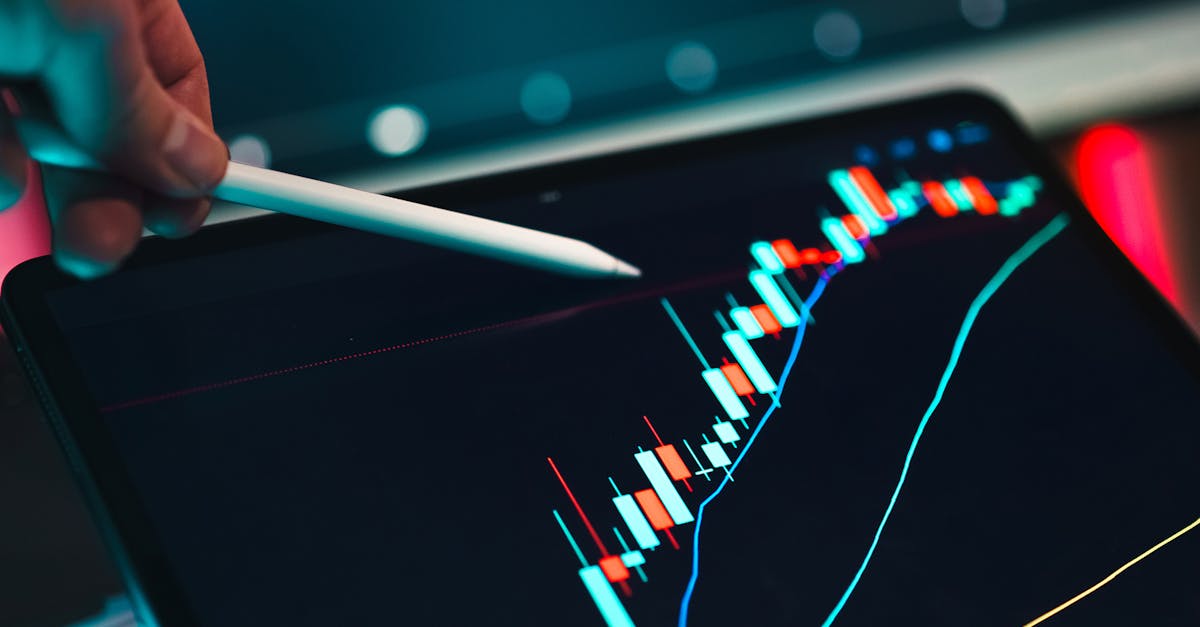 pexels-photo-30572289-30572289 Close-up of cryptocurrency trading analysis on a digital tablet, highlighting market trends.